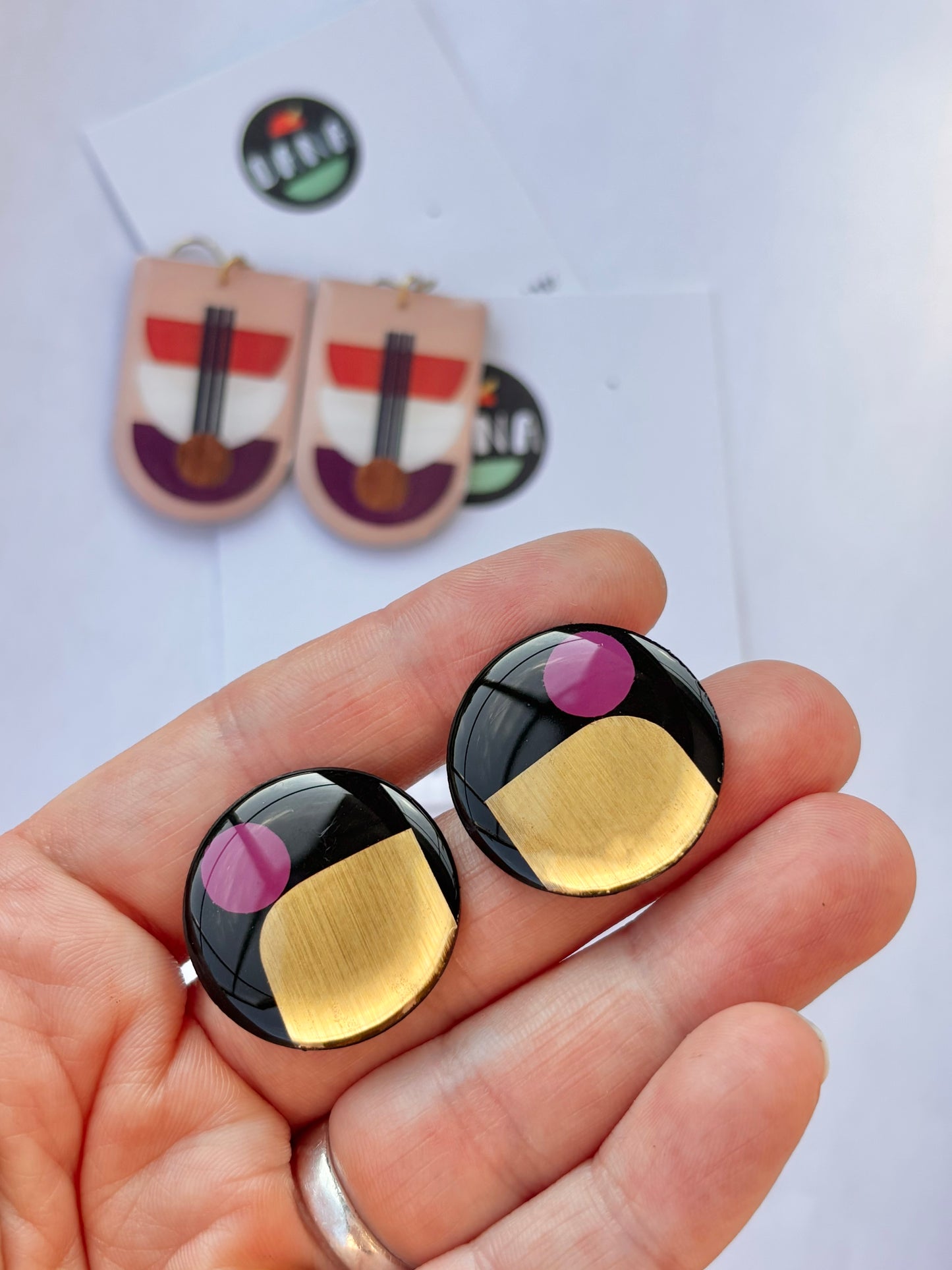 40% off large upcycled vinyl record studs in black, gold, and purple
