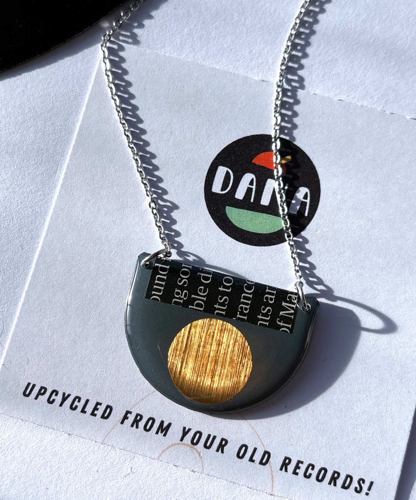 40% OFF graphic necklace in deep blue grey, gold and a hint of magazine paper