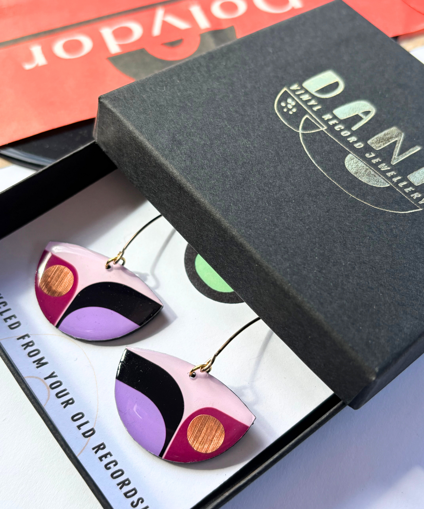 BEA in purple, lilac, and black with a pop of copper