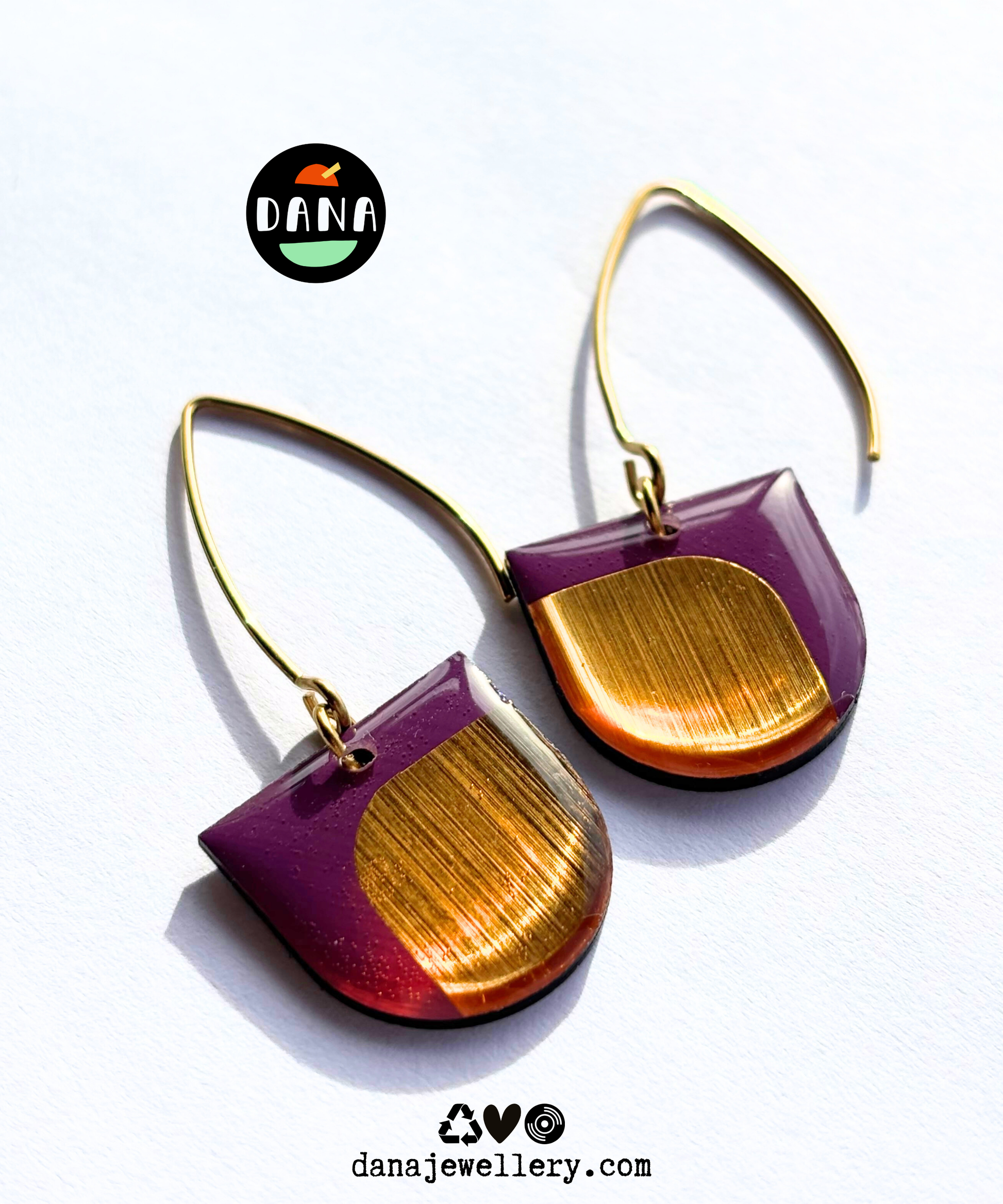 Pair of eco friendly minimalist modern purple and gold earrings handmade in Ireland from recycled vinyl record. 